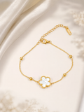Gold Bracelet with White Flower