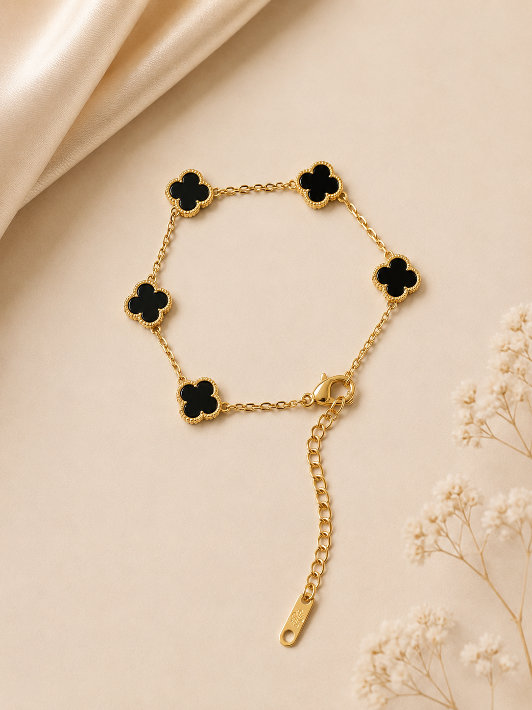 Gold bracelet with Black Flowers
